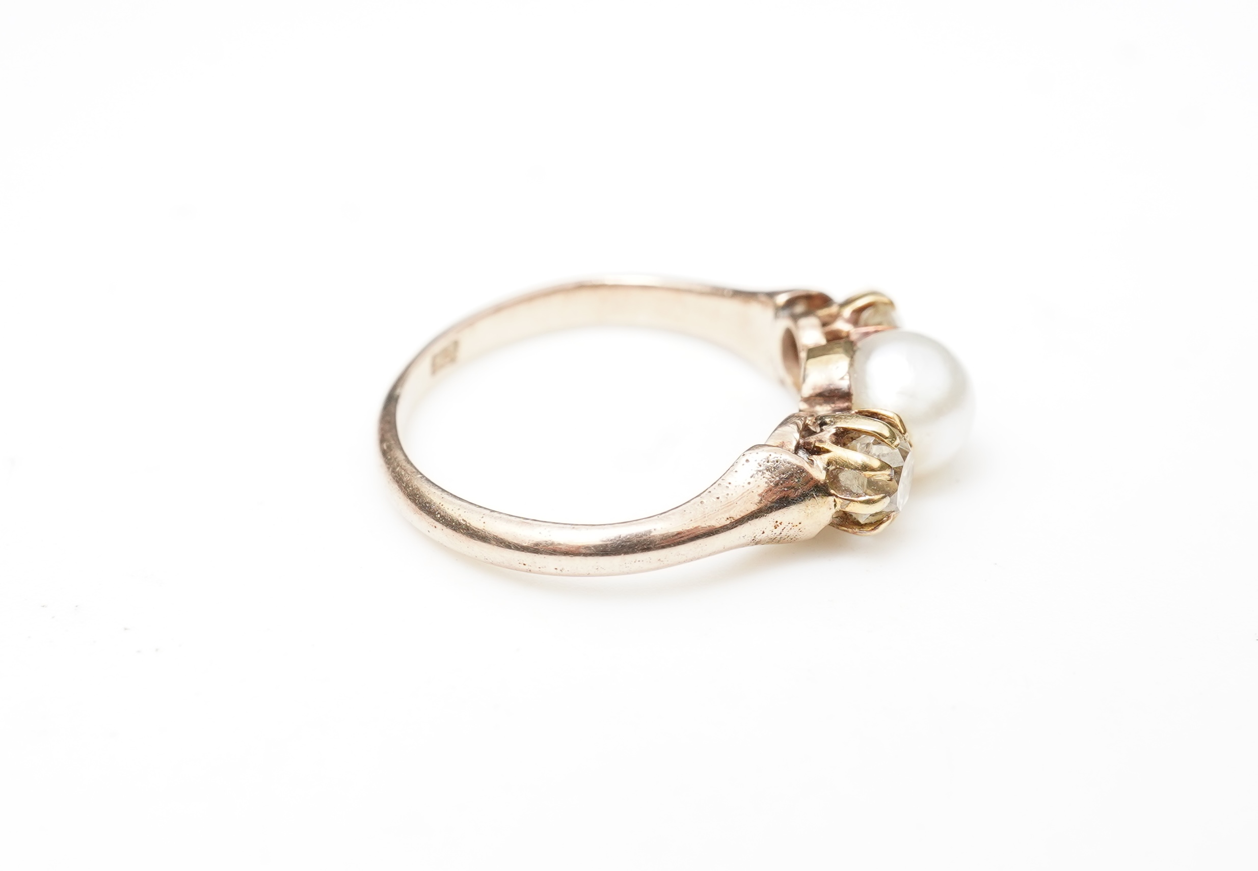 A late Victorian pearl and diamond ring, circa 1900